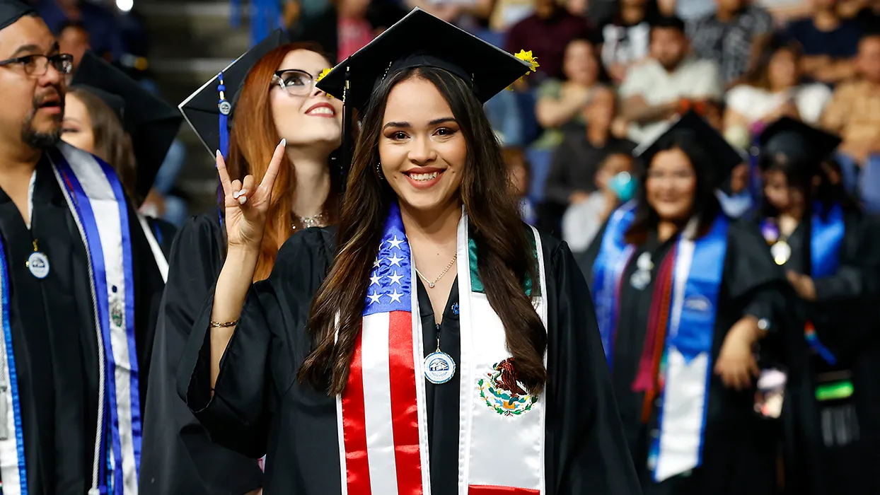 Excited graduates at the College of Social and Behavioral Sciences Commencement at the Toyota Arena in Ontario in May 2023. U.S. News & World Report has again recognized CSUSB’s graduate criminal justice and MBA online programs as among the best in the nation.