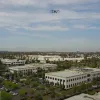 Aerial footage of Bourns Inc. in Riverside, California off of Columbia Ave.