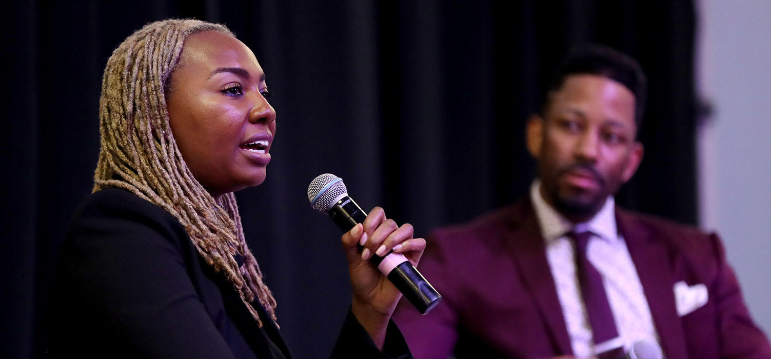 Opal Tometi (left) and Wil Greer, CSUSB assistant professor of education leadership and technology