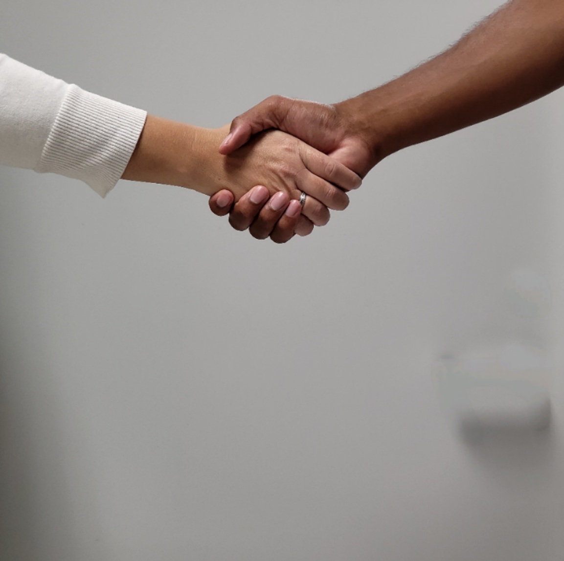 Two people shaking hands