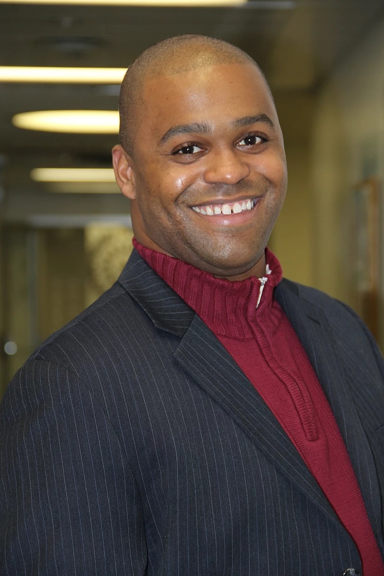 Headshot of a man smiling