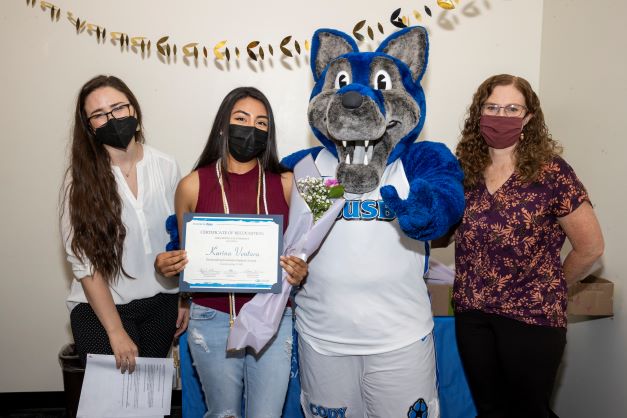 Stacy Morris, Cody the Coyote, Karina Ventura, and Amanda Wilcox-Herzog