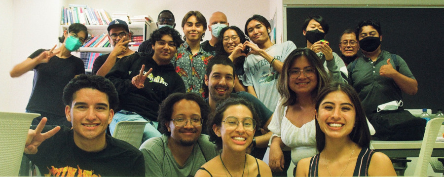 People smiling in a seminar room