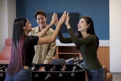 Residents in Coyote Village Game Room