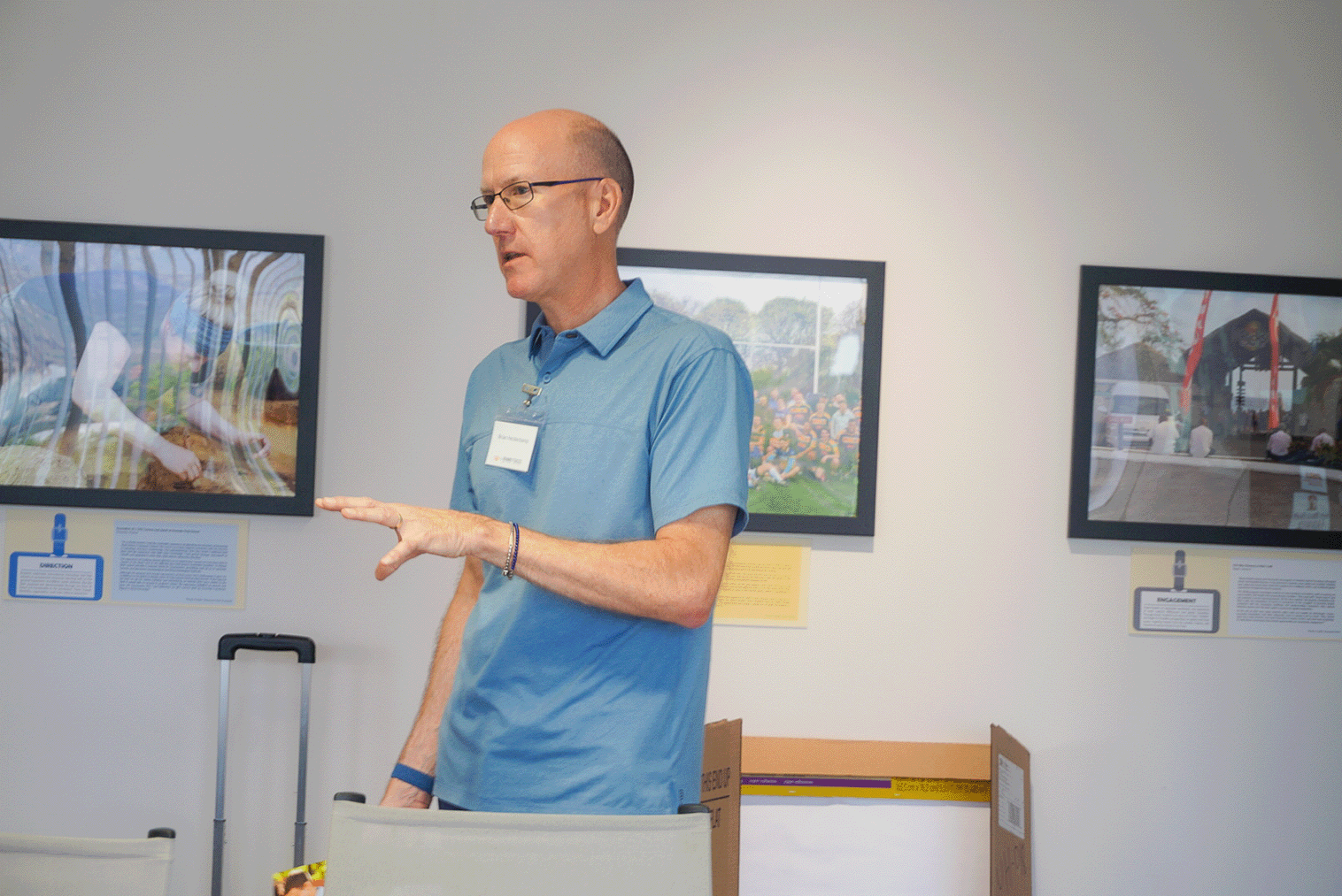 The image shows a man teaching at the event