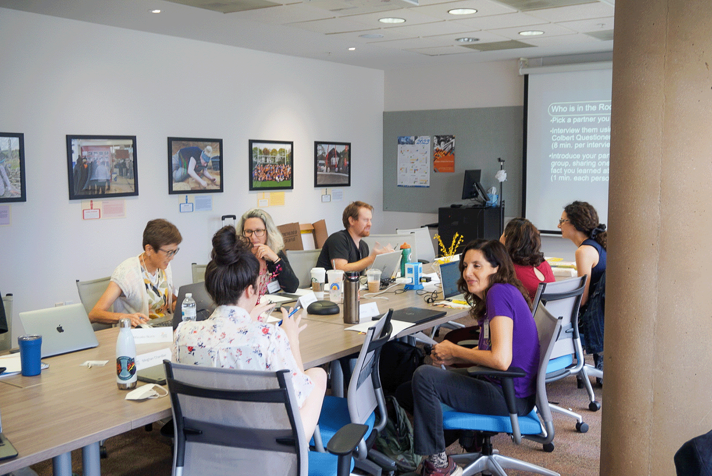 This image teachers working together at the table