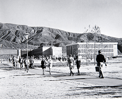 first students walking on campus