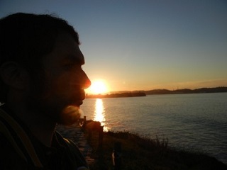 Daniel Robles pondering at a beautiful sunset in Spain.