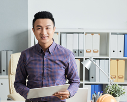 Young Asian entrepreneur smiling