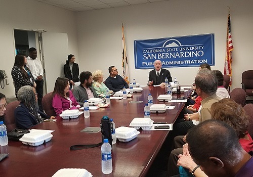 Attendees sitting around the table