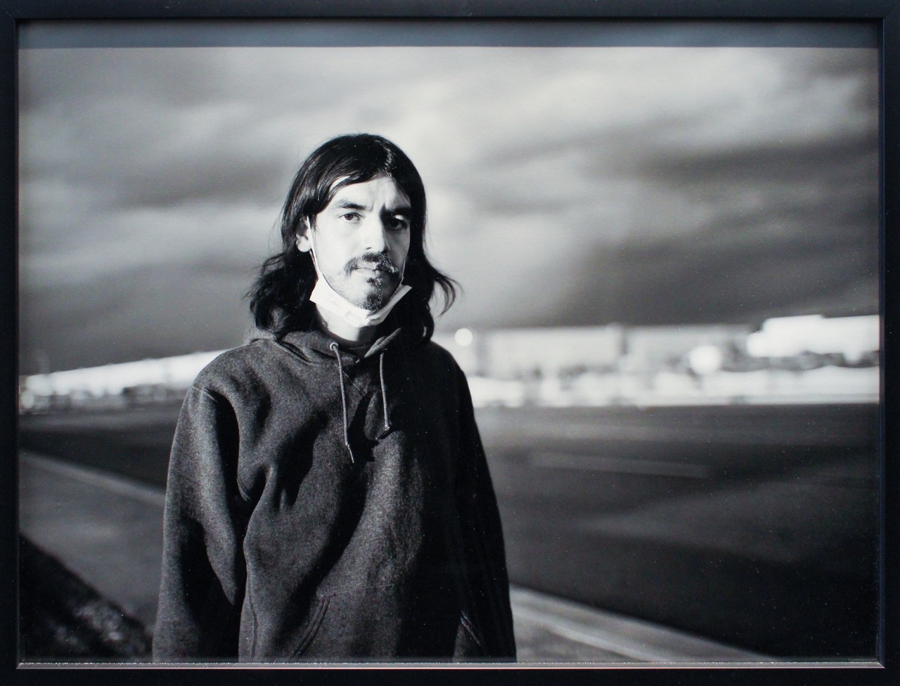 Juan in front of the newest warehouse