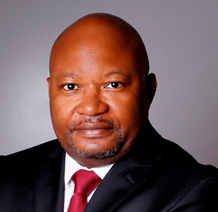 Dr. Lewis Njualem