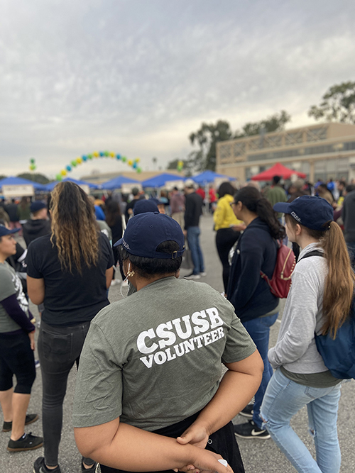 CSUSB student volunteer in line to be checked for MLK Day of Service.