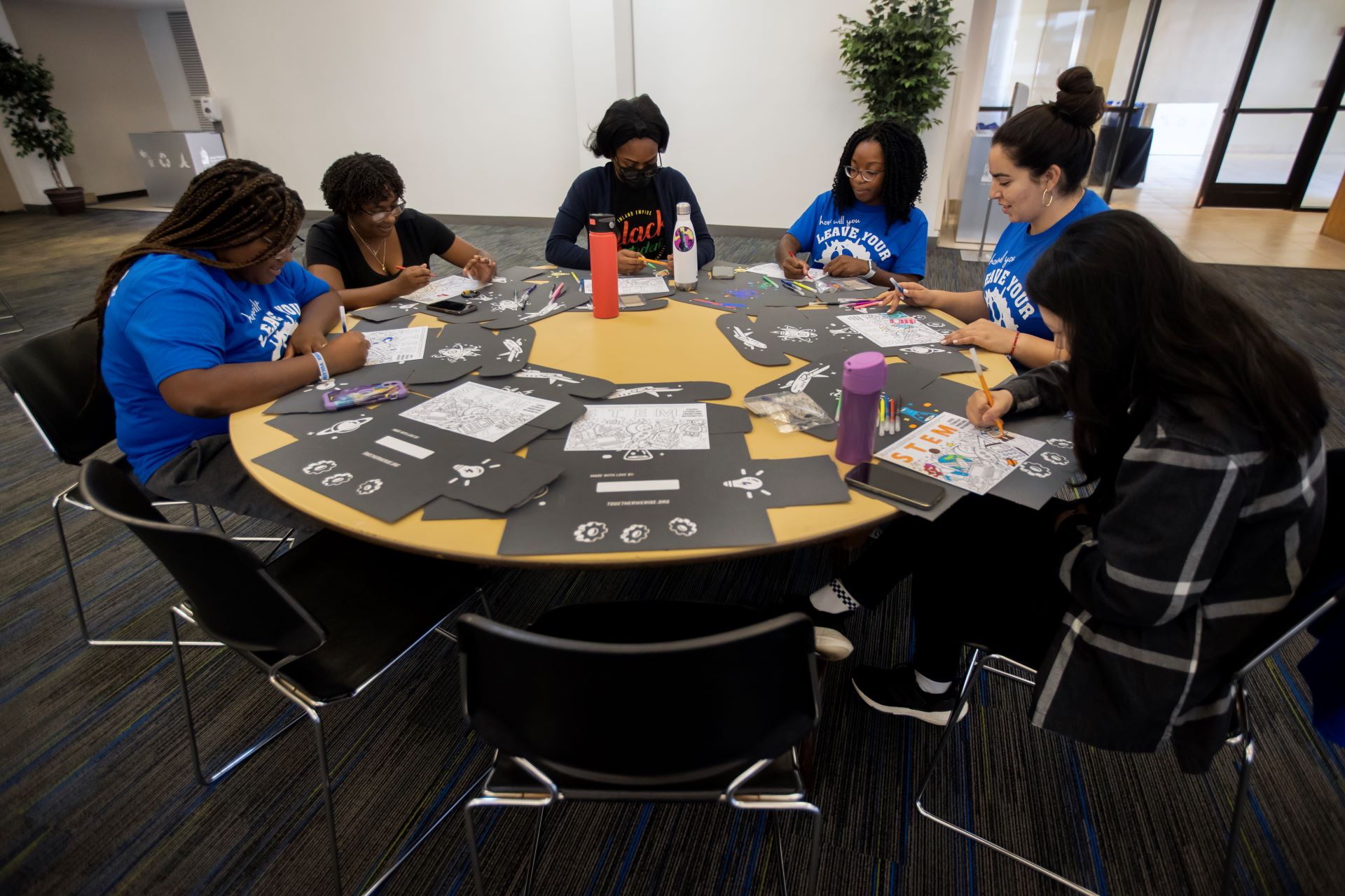 CSUSB volunteers decorating Stem boxes