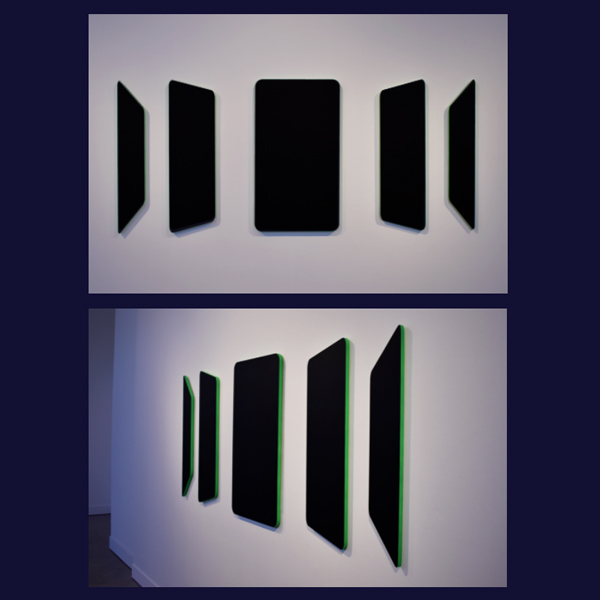 Acrylic paint on MDF panels. Five black panels decreasing in size and changing perspective out from the center. The surfaces of the panels are matte black and the edges are neon green.