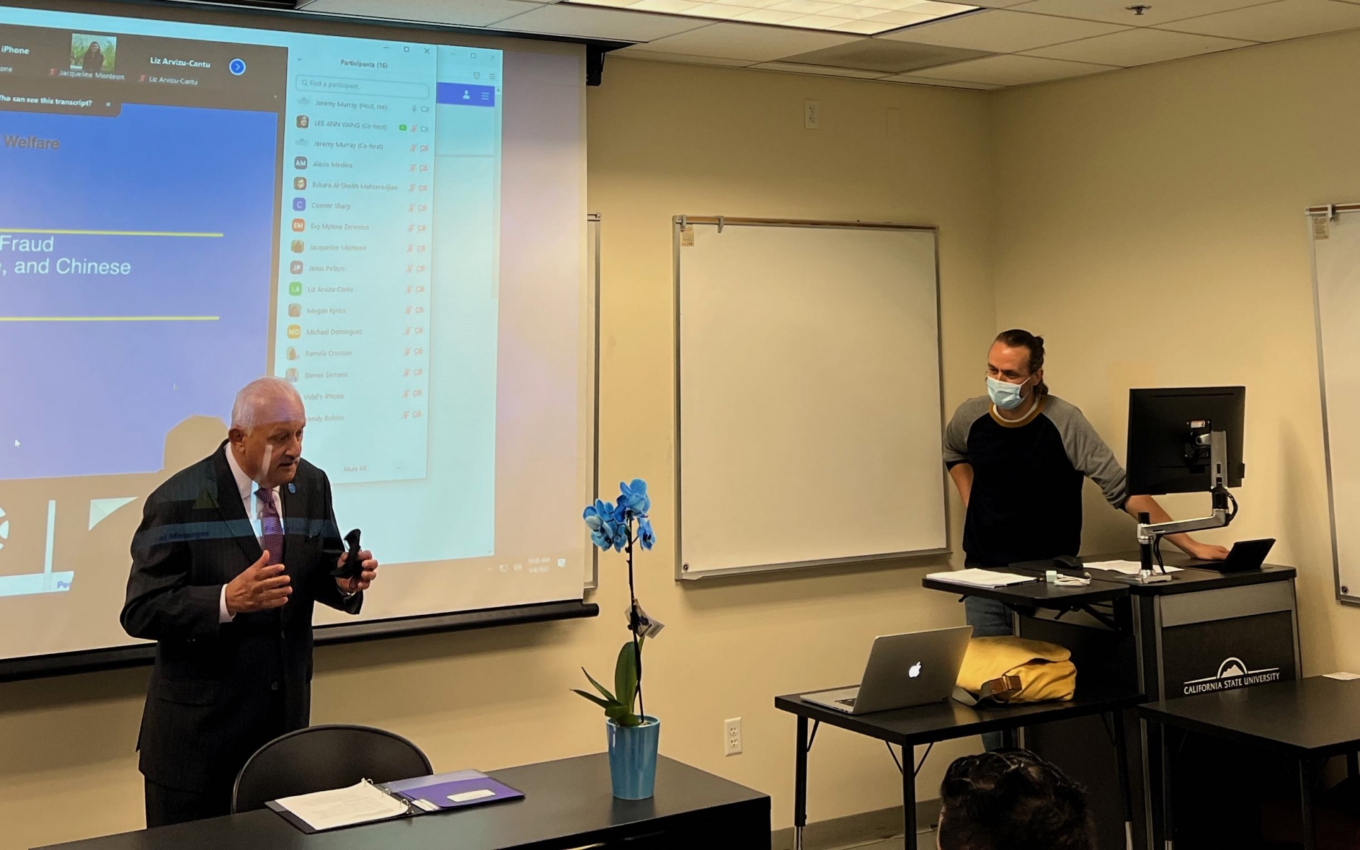 President Morales presenting the award in Dr. Murray's Classroom