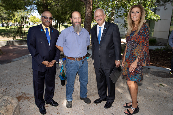 Sastry Pantula, dean of the College of Natural Sciences; Erik Melchiorre, geological sciences professor and winner of the Outstanding Scholarship, Research, Creativity Award; CSUSB President Tomás Morales; and CSUSB Provost Shari McMahan