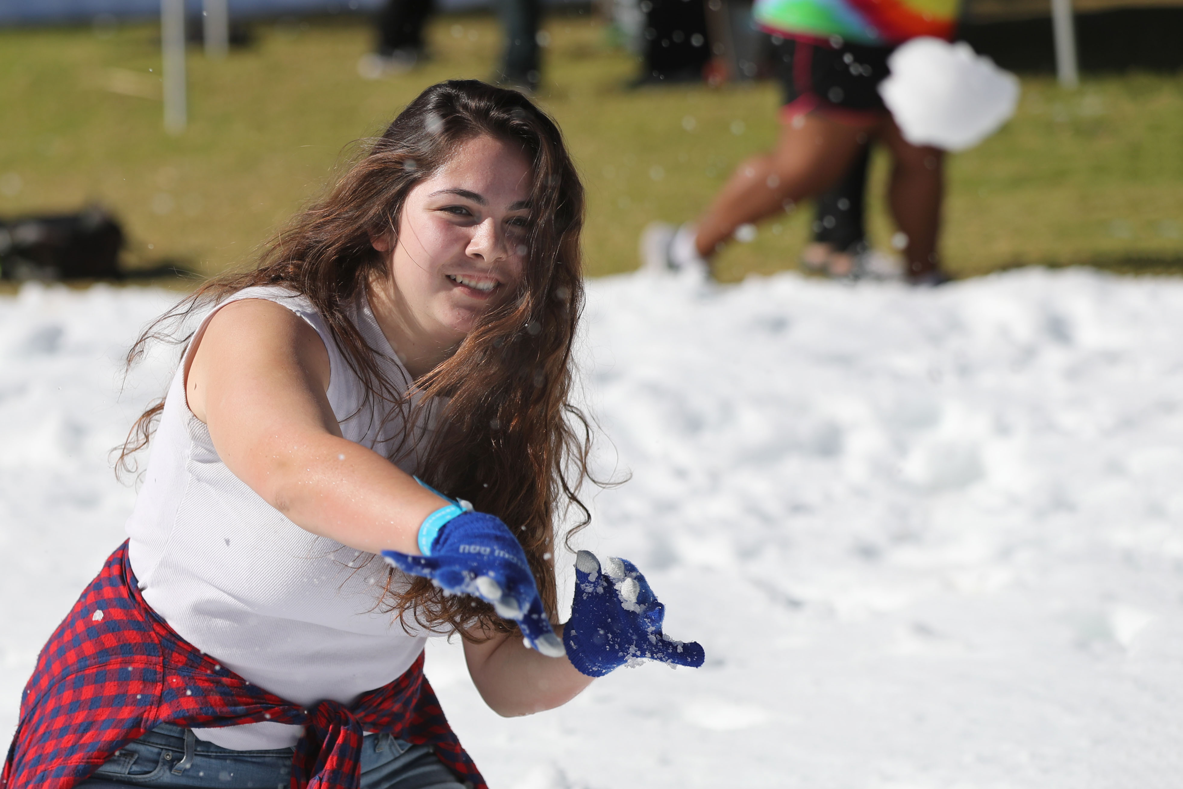 Tossing snow balls during Snow Day at CSUSB.