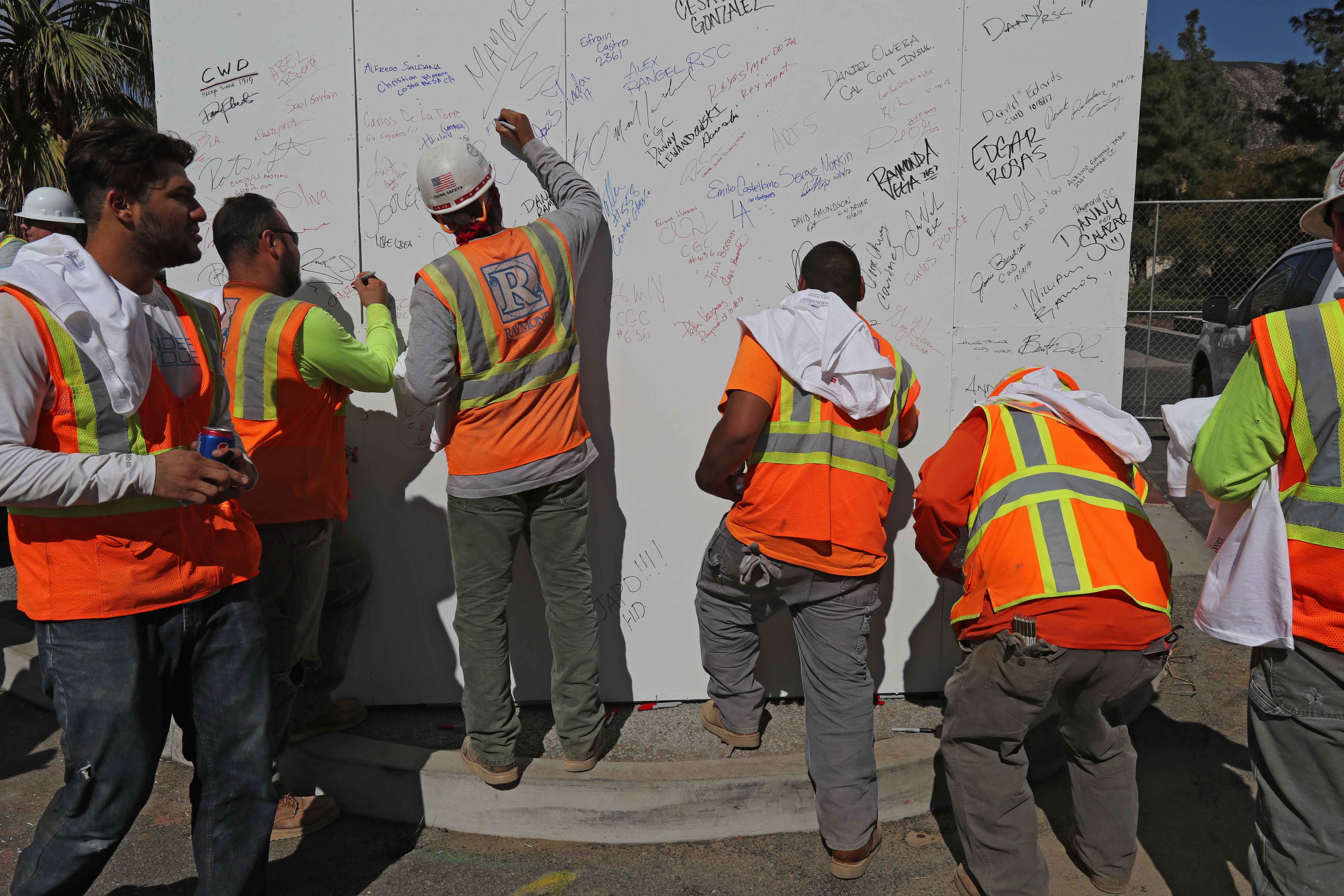 CSUSB staff photographer Robert A. Whitehead documented the topping-out ceremony at the work site, near the Jack H. Brown College of Business and Public Administration CSUSB staff photographer Robert A. Whitehead documented the topping-out ceremony at the work site, near the Jack H. Brown College of Business and Public Administration