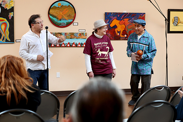 Juan Delgado (left) CSUSB professor of English, Pat Murkland and Ernest Siva, elder of the Morongo Band of Mission Indians at the annual Native Voices Poetry Festival at the Dorothy Ramon Learning Center in Banning in February.