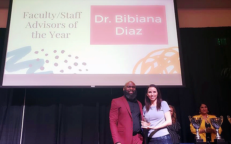 Dr. Diaz receiving award