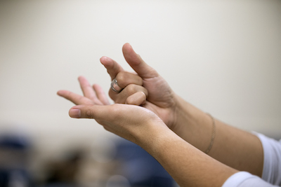 hands signing