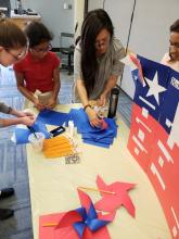 Students creating Pinwheels at Heritage Month Celebration