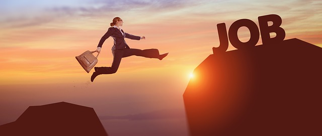 Guy jumping gap to a stone work that simply says JOB