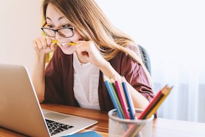 Woman taking exam on the computer