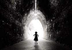 Little girl in tunnel