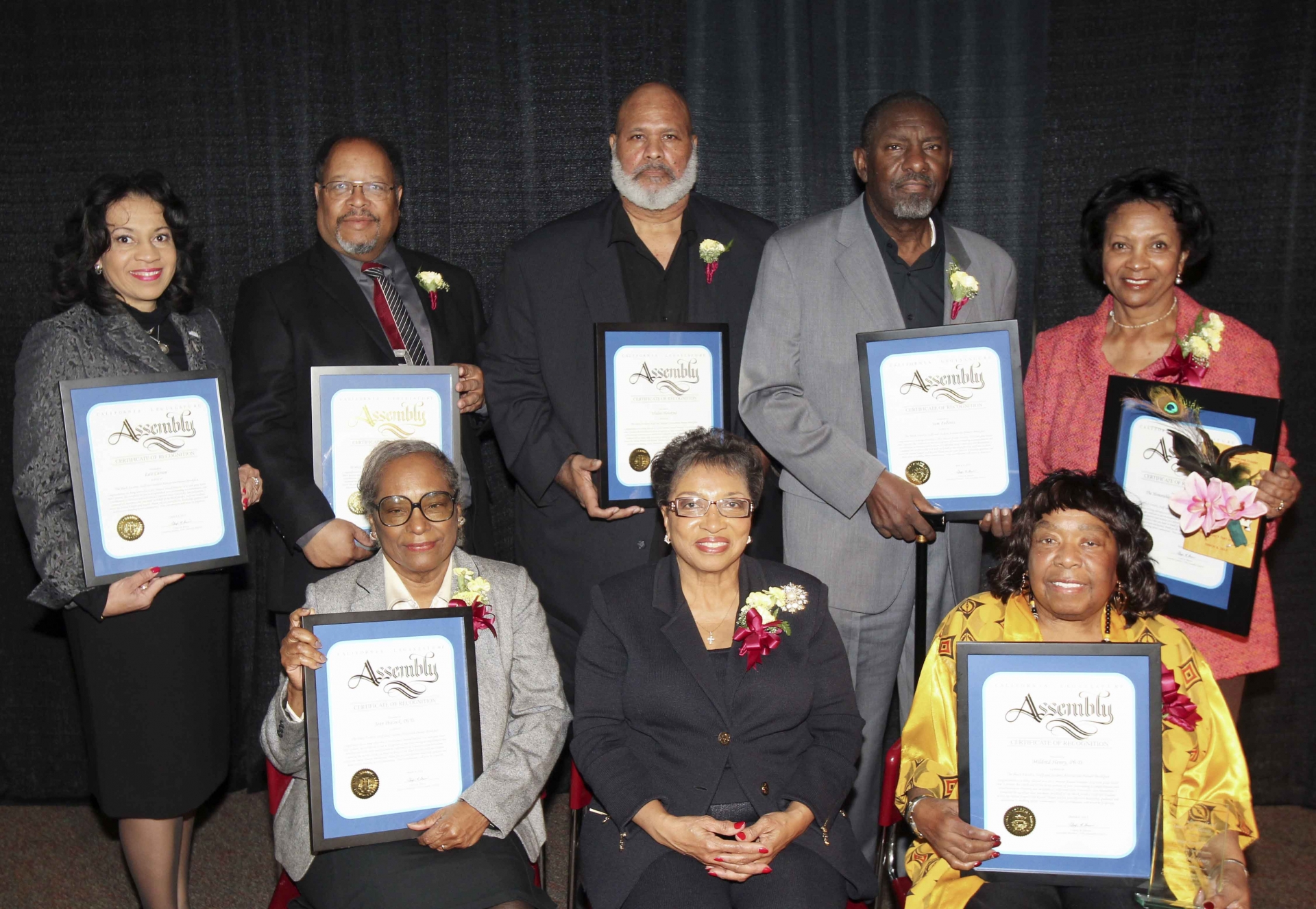 From left, Twillea Evans-Carthen, J. Milton Clark, Walter Hawkins, Sam Fellows and Amina Carter, Jean Peacock, Cheryl Brown and Dr. Mildred Henry.