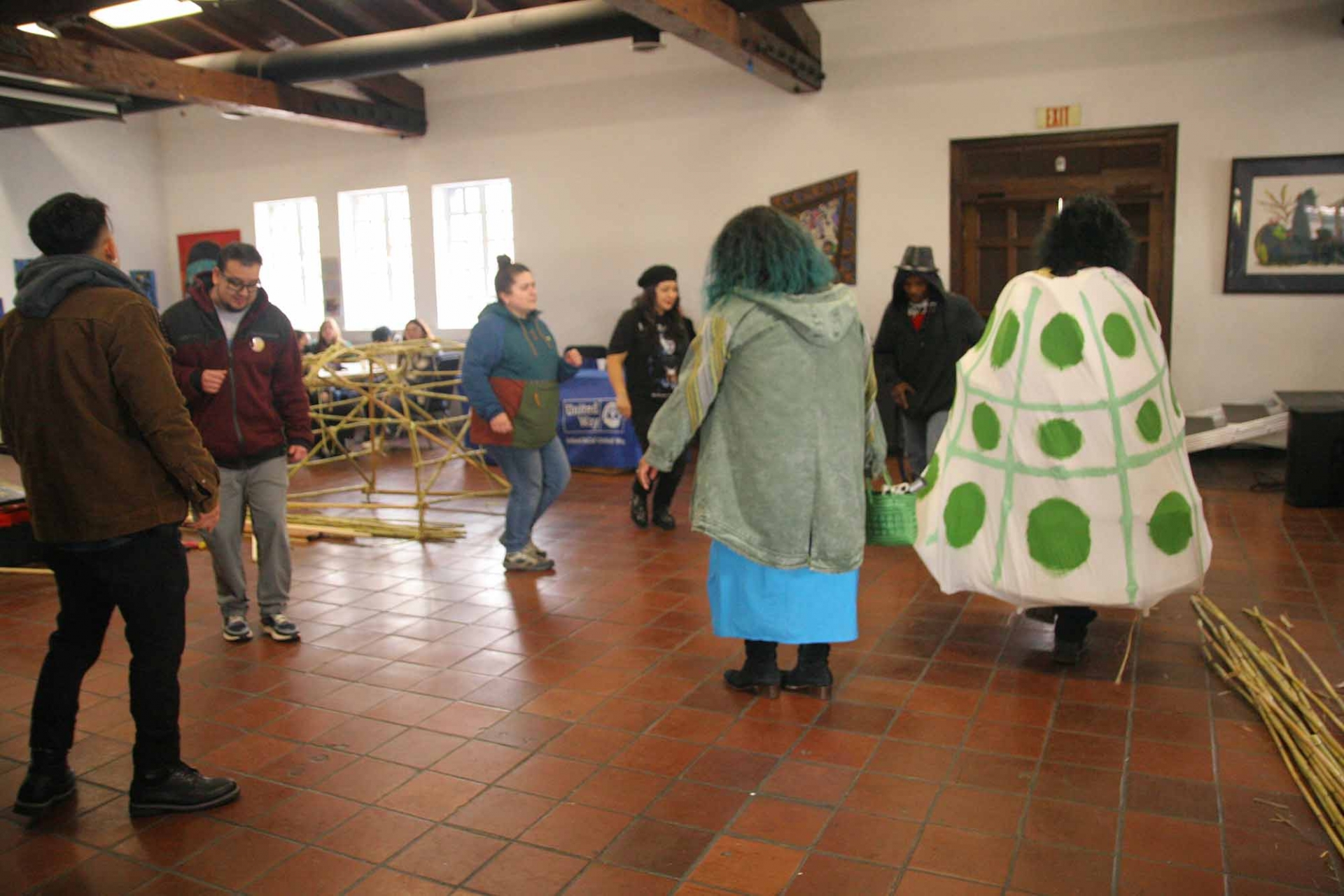 A costumed turtle (right) dances during a celebration of Afro-Oaxacan heritage at the Garcia Center for the Arts.