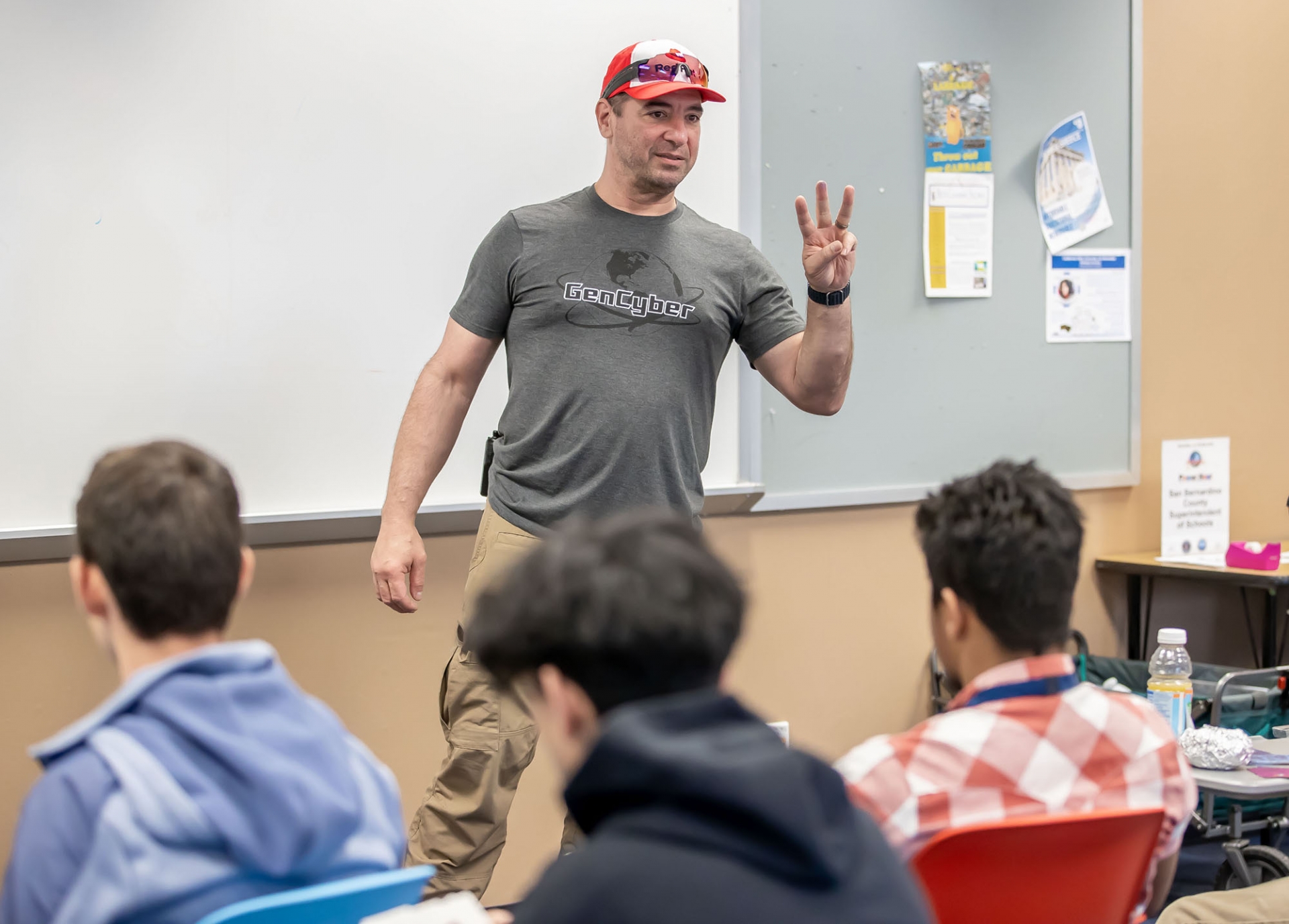 Vincent Nestler, director of the CSUSB Cybersecurity Center,  speaks with the students about computer technology and cyber security at the GenCyber Summer Day Camp at CSUSB.