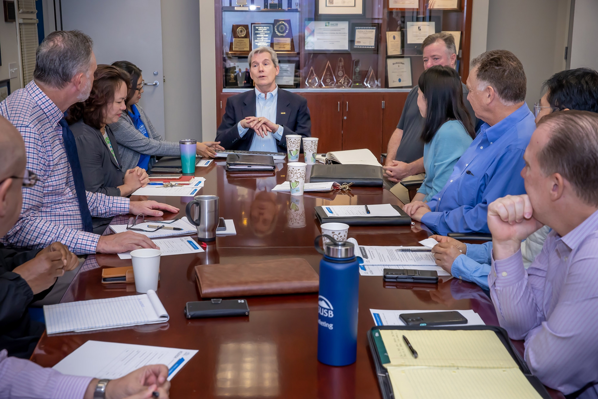 Montgomery Van Wart, the 2022-23 Outstanding Professor Award recipient, leads a meeting in the Jack H. Brown College of Business and Public Administration.>>