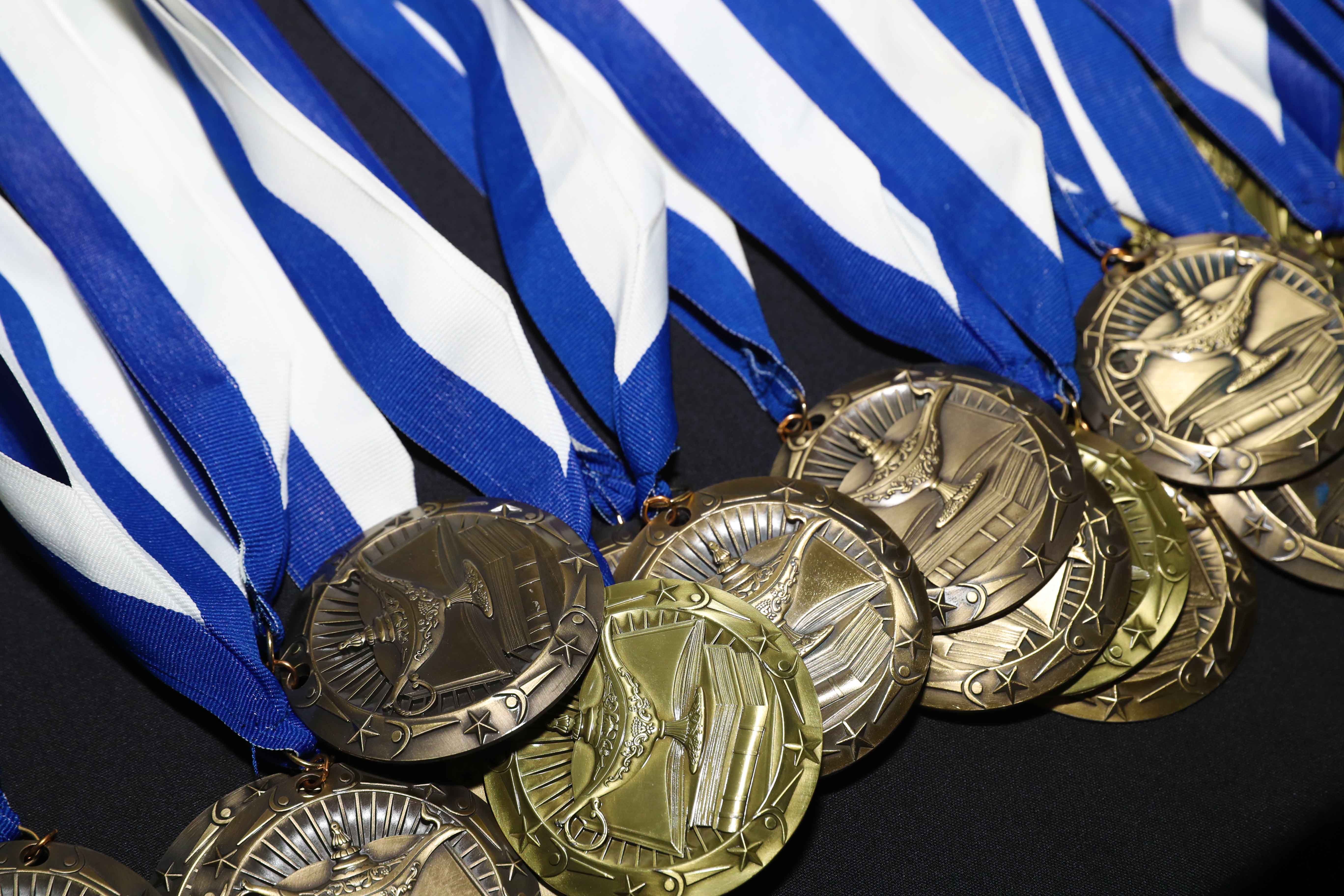 The seniors were presented with a special University Honors Program medallion and certificate acknowledging their completion of the program.