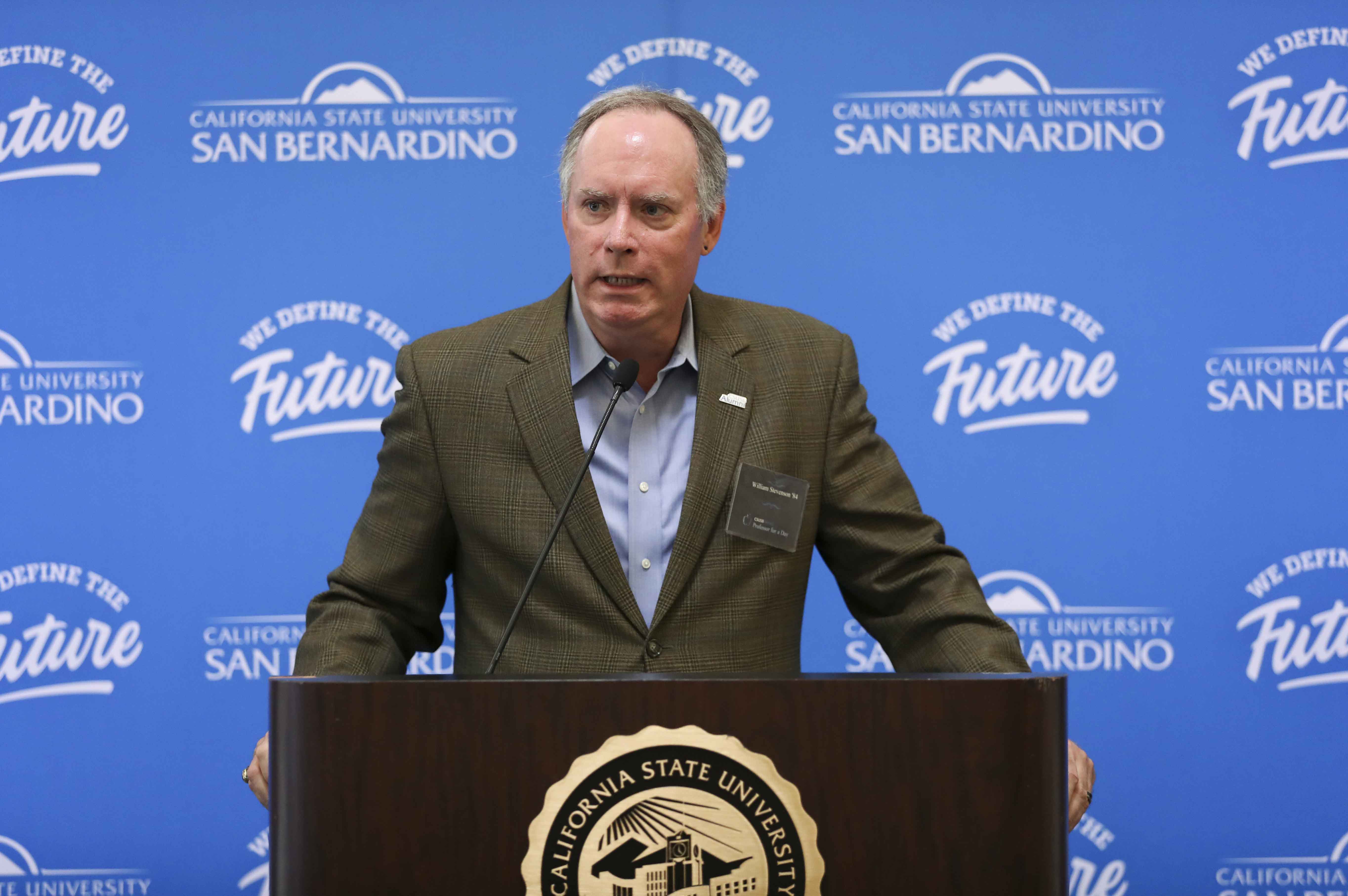 William Stevenson, a 1984 CSUSB graduate and now a lecturer at his alma mater in the accounting and finance department, speaks at 2019 Alumni Professor for a Day luncheon.