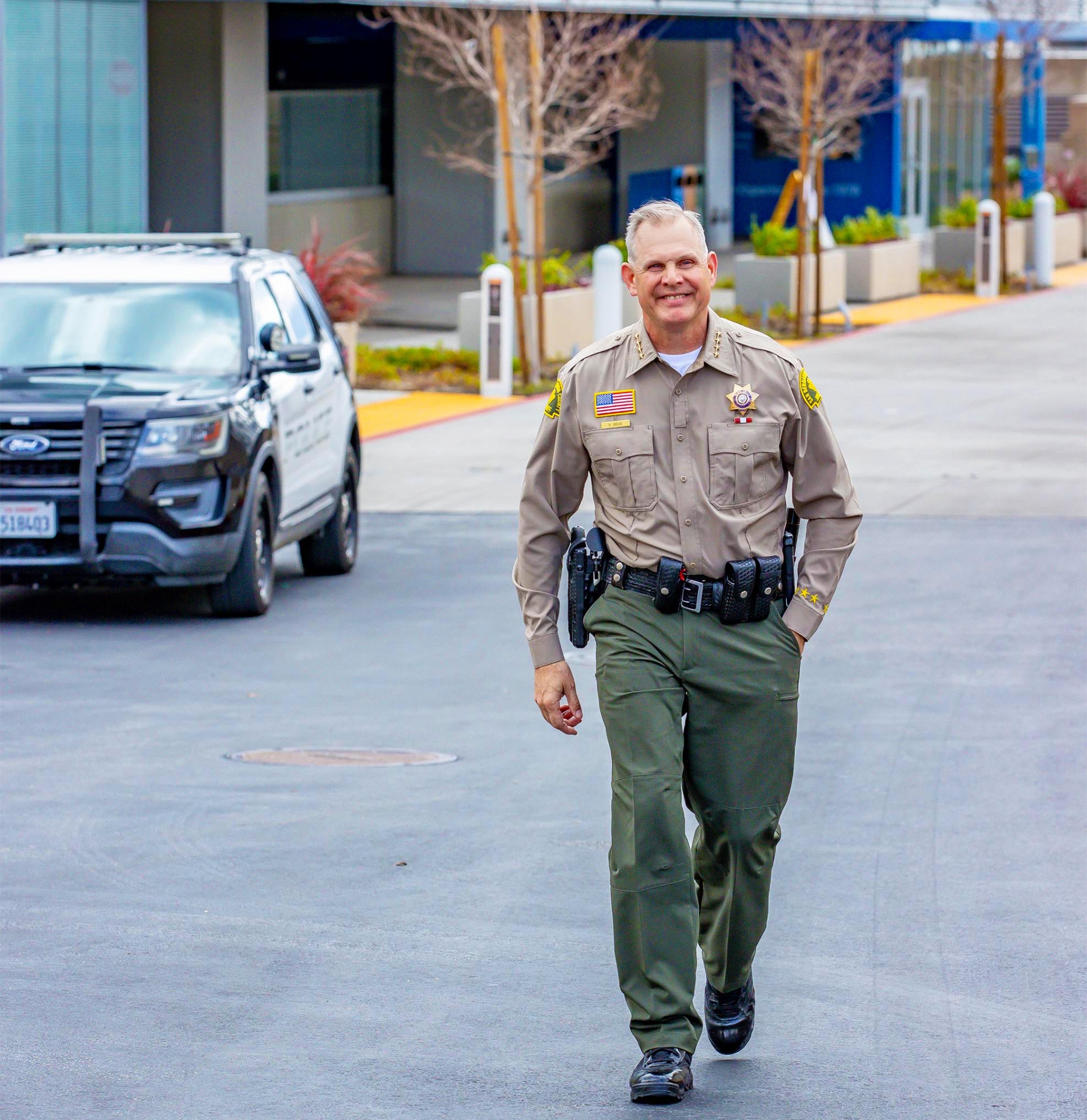 Sheriff Shannon Dicus walks through CSUSB, his alma mater.
