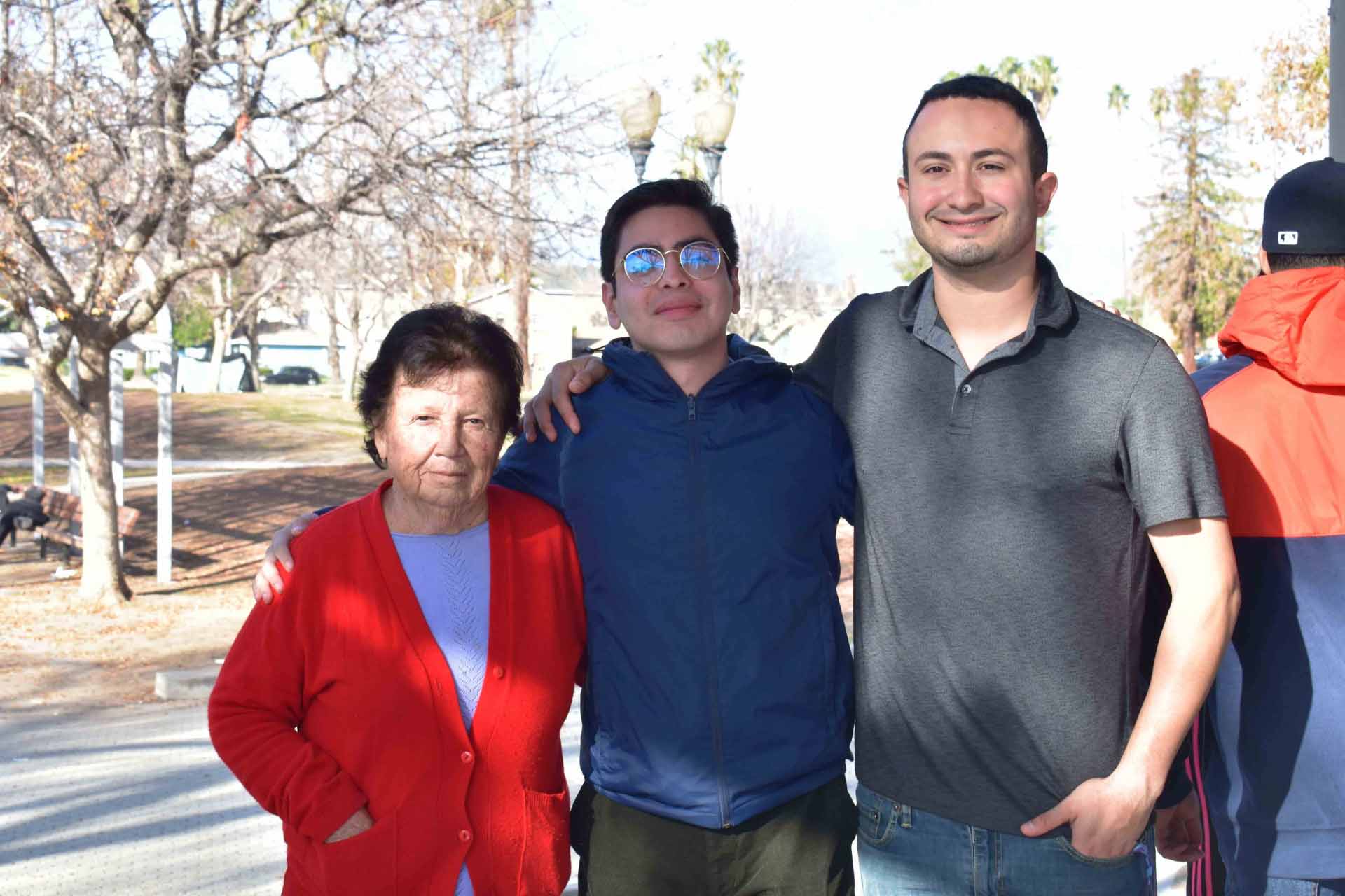 Gaeta (center) when he was a CSUSB student, with his cousin (right), and Gaeta’s aunt (left) when they were on the CSUSB campus volunteering for a holiday food drive.