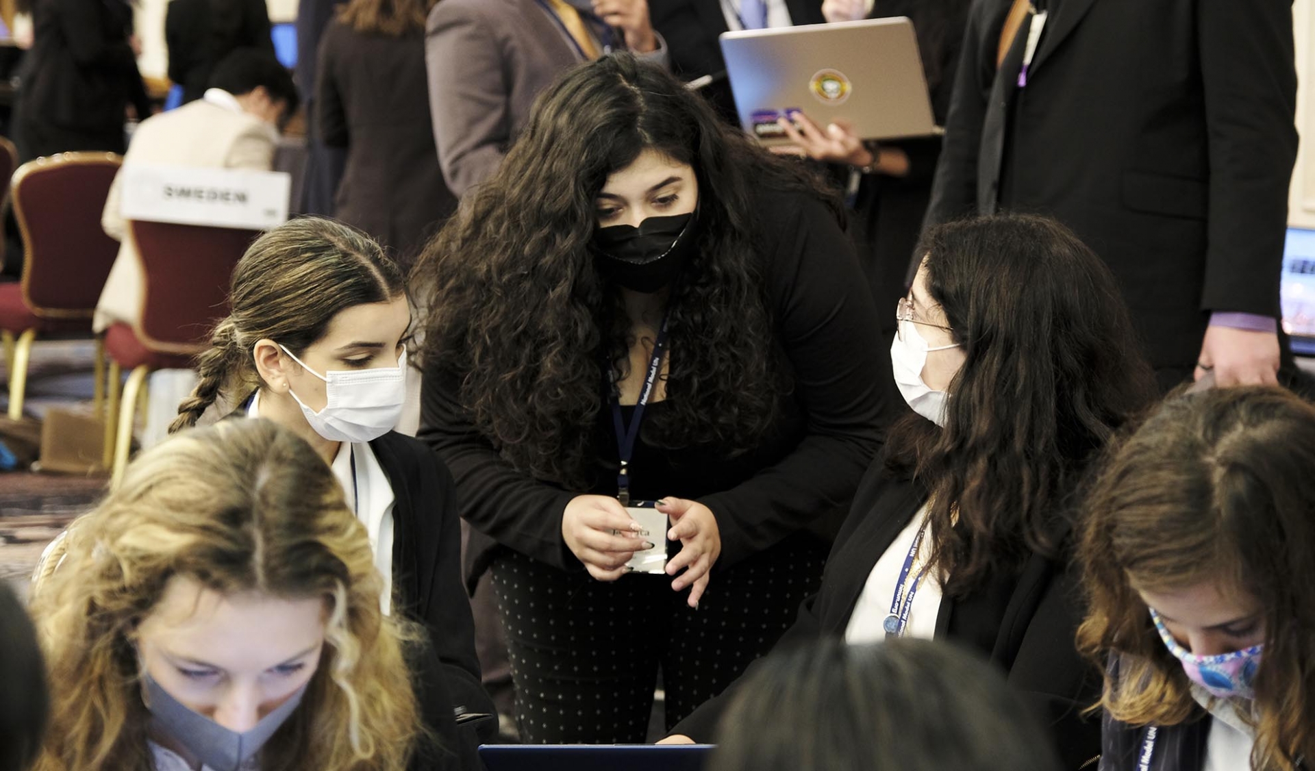 CSUSB MUN Kobe Cynthia Roman working with her peers at Nuclear Non-Proliferation Treaty Review Committee 