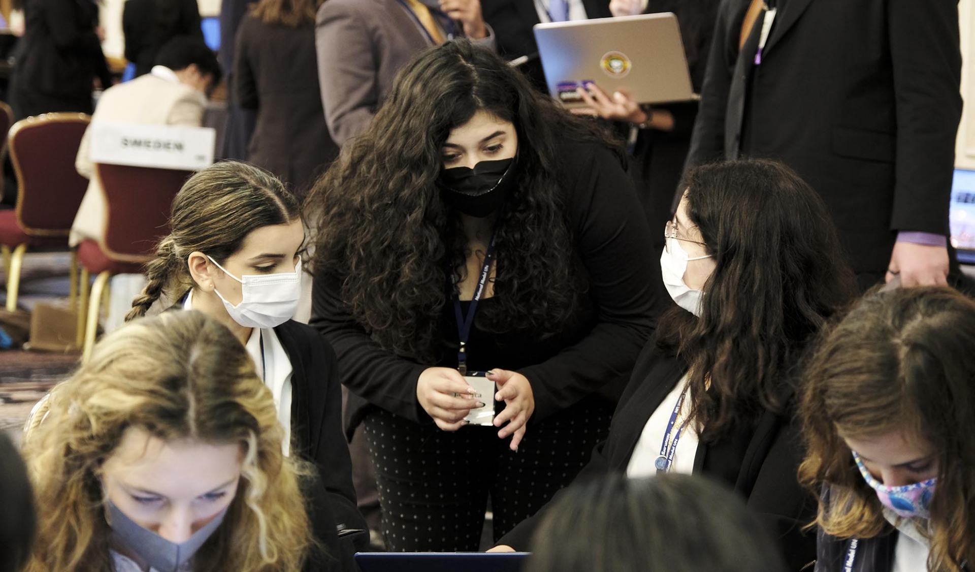 CSUSB MUN Kobe Cynthia Roman working with her peers at Nuclear Non-Proliferation Treaty Review Committee