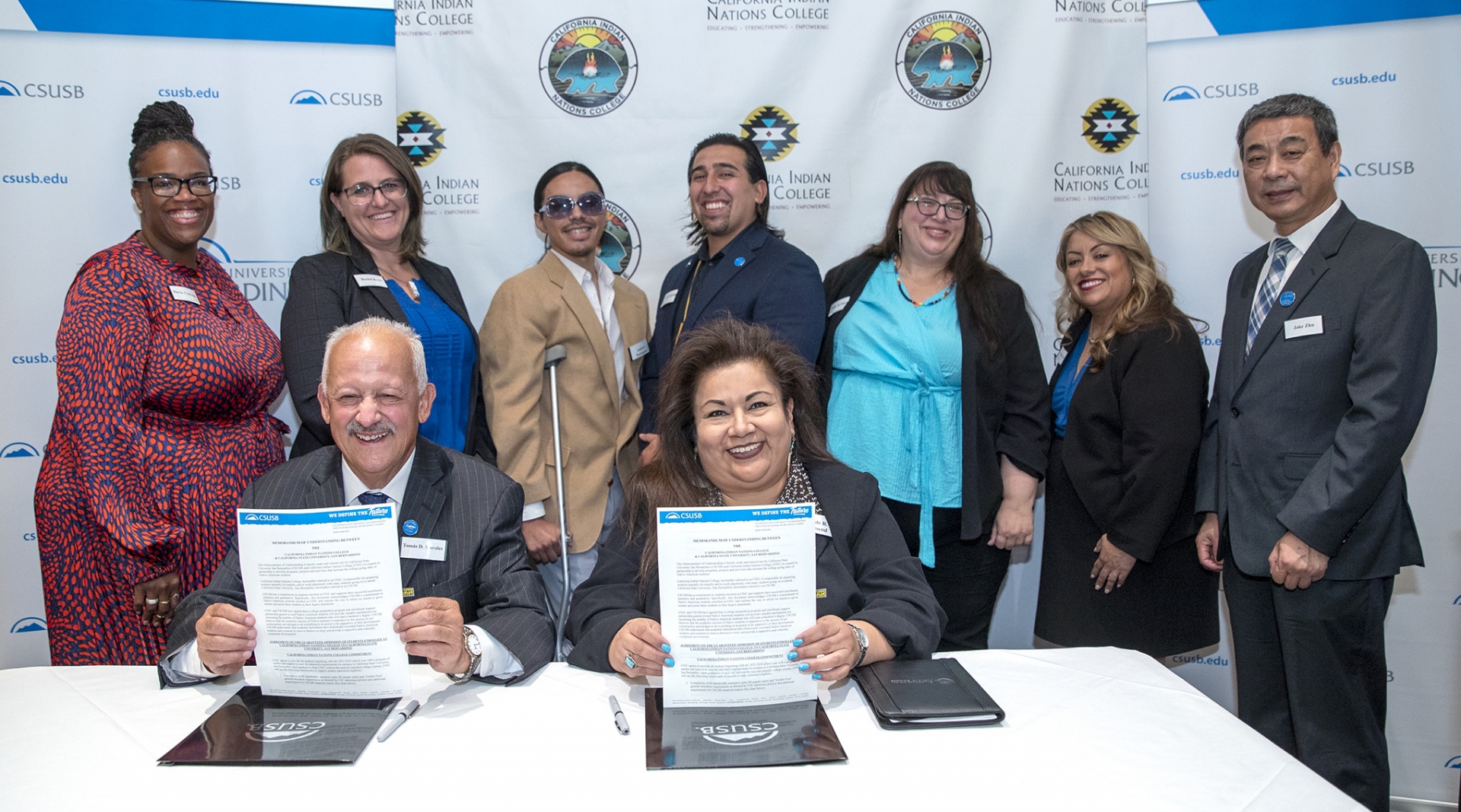 Front, from left, Tomás D. Morales, president of California State University, San Bernardino, and Celeste Townsend, president and CEO of the California Indian Nations College. Back row, from left, Daria Graham, CSUSB associate vice president for Student Affairs and dean of students; Rachel Beech, CSUSB associate vice president Enrollment Management: Andrew Rodriguez, CSUSB student; Carlos “Two Bears” Gonzales, coordinator, CSUSB First Peoples Center; Molly Springer, CSUSB associate vice president, Student Equity; Paz Oliverez, CSUSB vice president of Student Affairs; Jake Zhu, dean, CSUSB Palm Desert Campus.