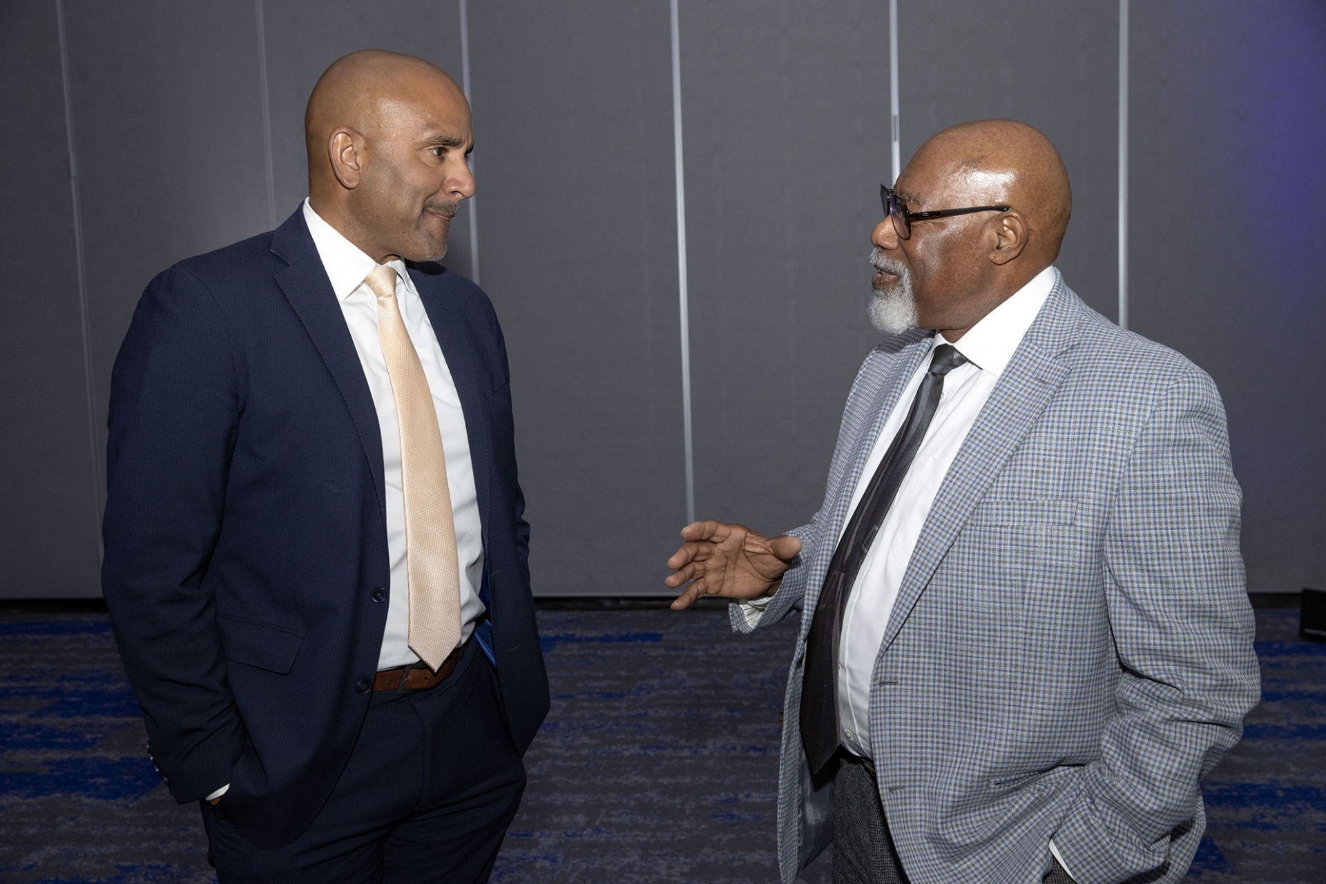 Rafik Mohamed, CSUSB provost and vice president of Academic Affairs, chats with Gregory Richardson, a lecturer in the Educational Leadership doctoral program at the James R. Watson and Judy Rodriguez Watson College of Education, during the Cooperative Economic Empowerment Movement joint meeting (CEEM) at the university on Jan.27.