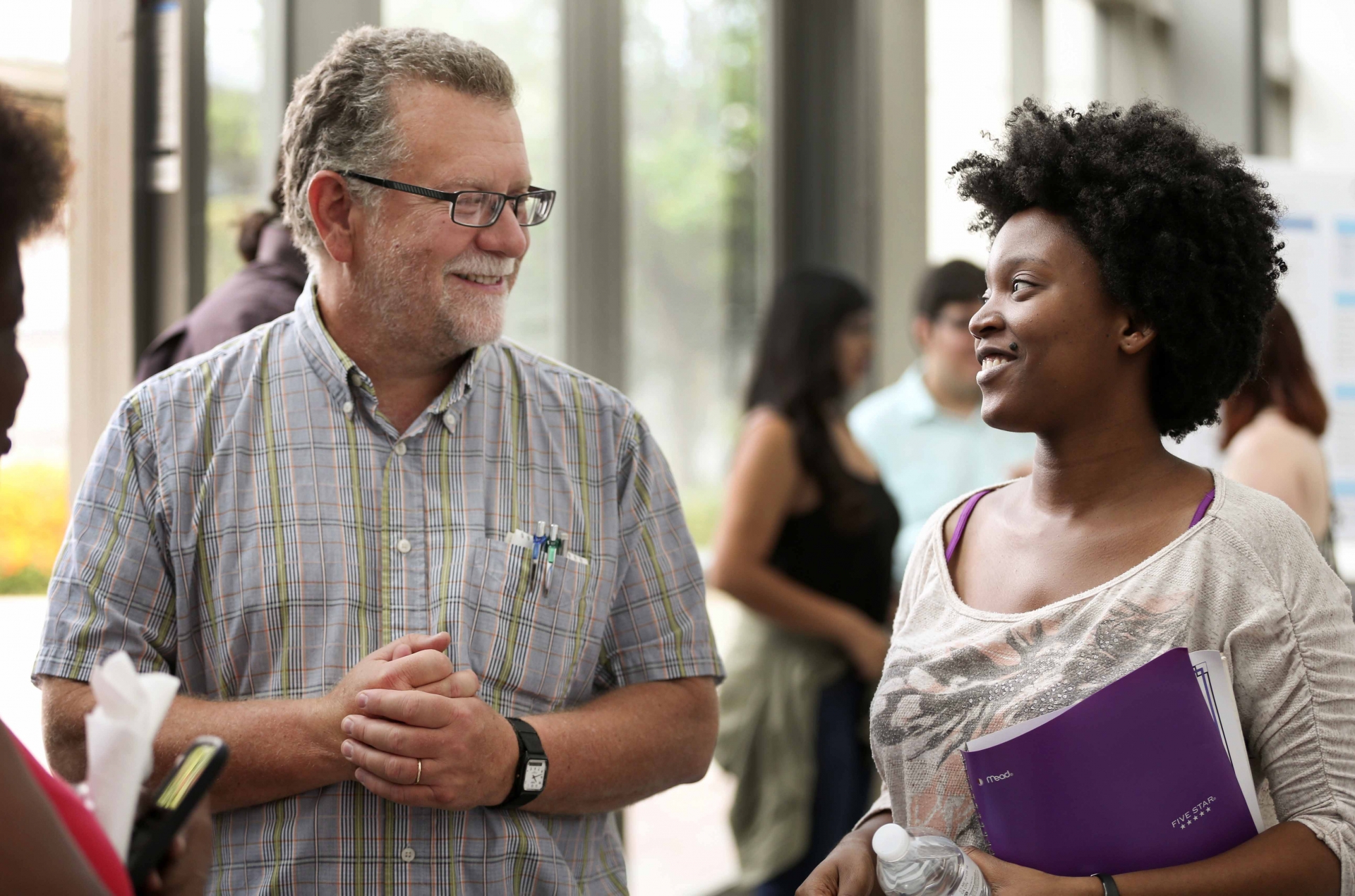 Tim Usher (l), professor of physics, and Kayla Black, student, at the Center for Advanced Functional Materials Summer Research Open House and CREST Open House in July 2015. Usher will serve as the principal investigator for the National Science Foundation’s International Research Experiences for Students grant at CSUSB.