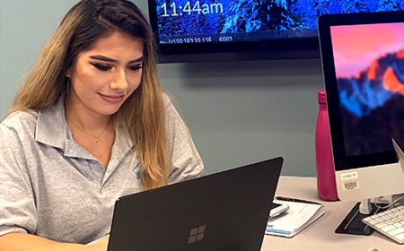 student in high tech classroom