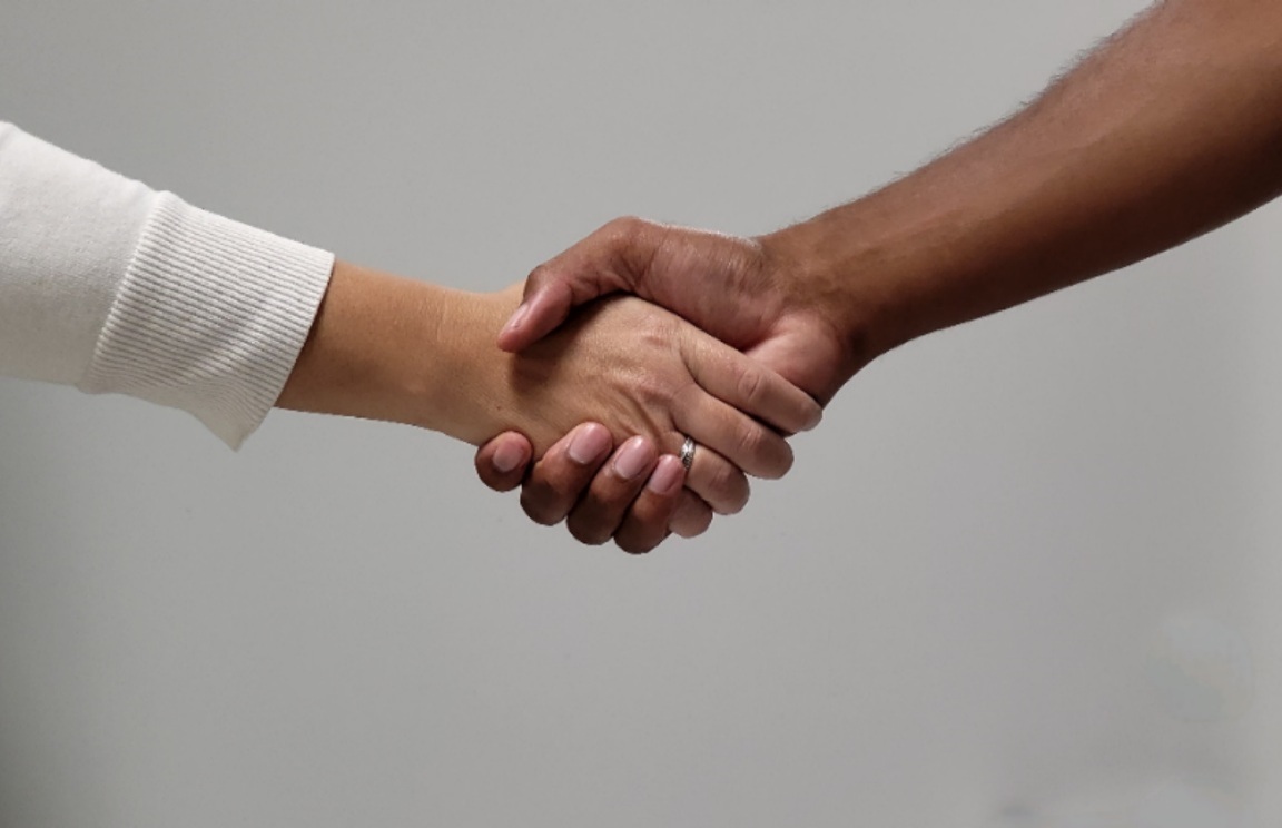 Two people shaking hands