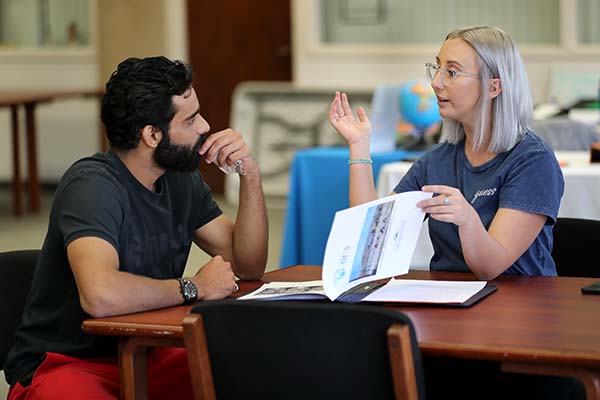 One-on-one discussions are the aim of The Human Library, created to challenge societal stereotypes and prejudices through positive dialogue. Photo: Corinne McCurdy/CSUSB