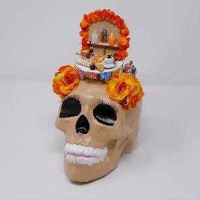 decorated calavera with shrine