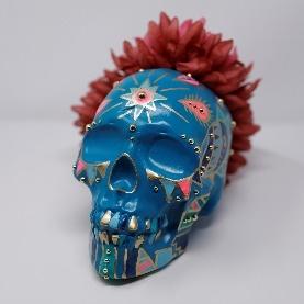 blue and red decorated calavera