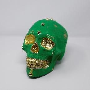 green decorated calavera