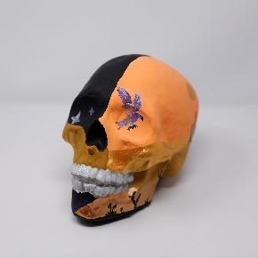 orange decorated calavera